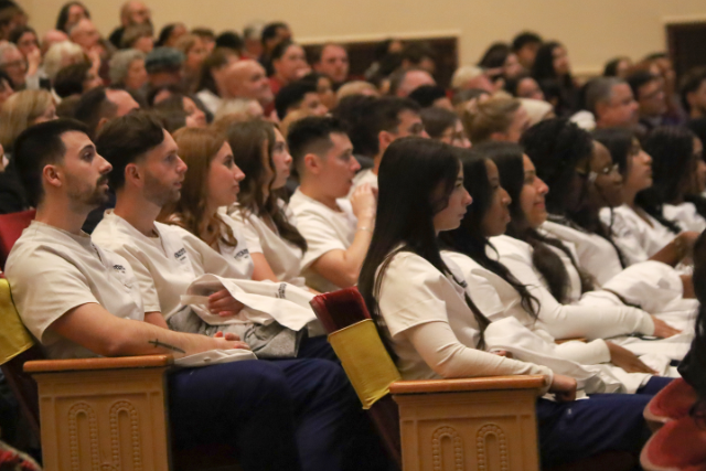 Nursing students awaiting the presentation of their white coats, marking a significant step in their professional journey. PHOTO: Blake Modri